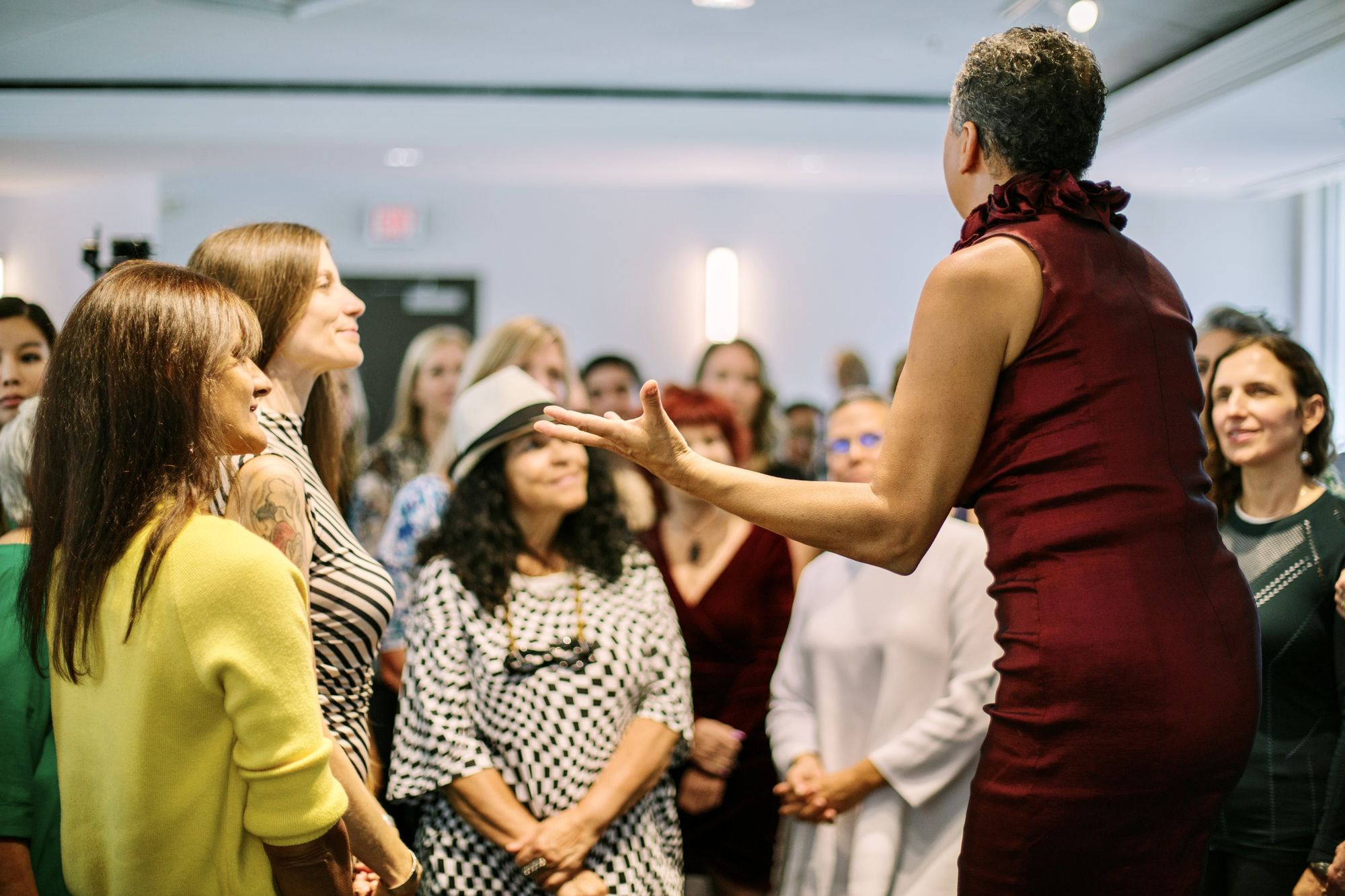 Suzanne holding a room of women