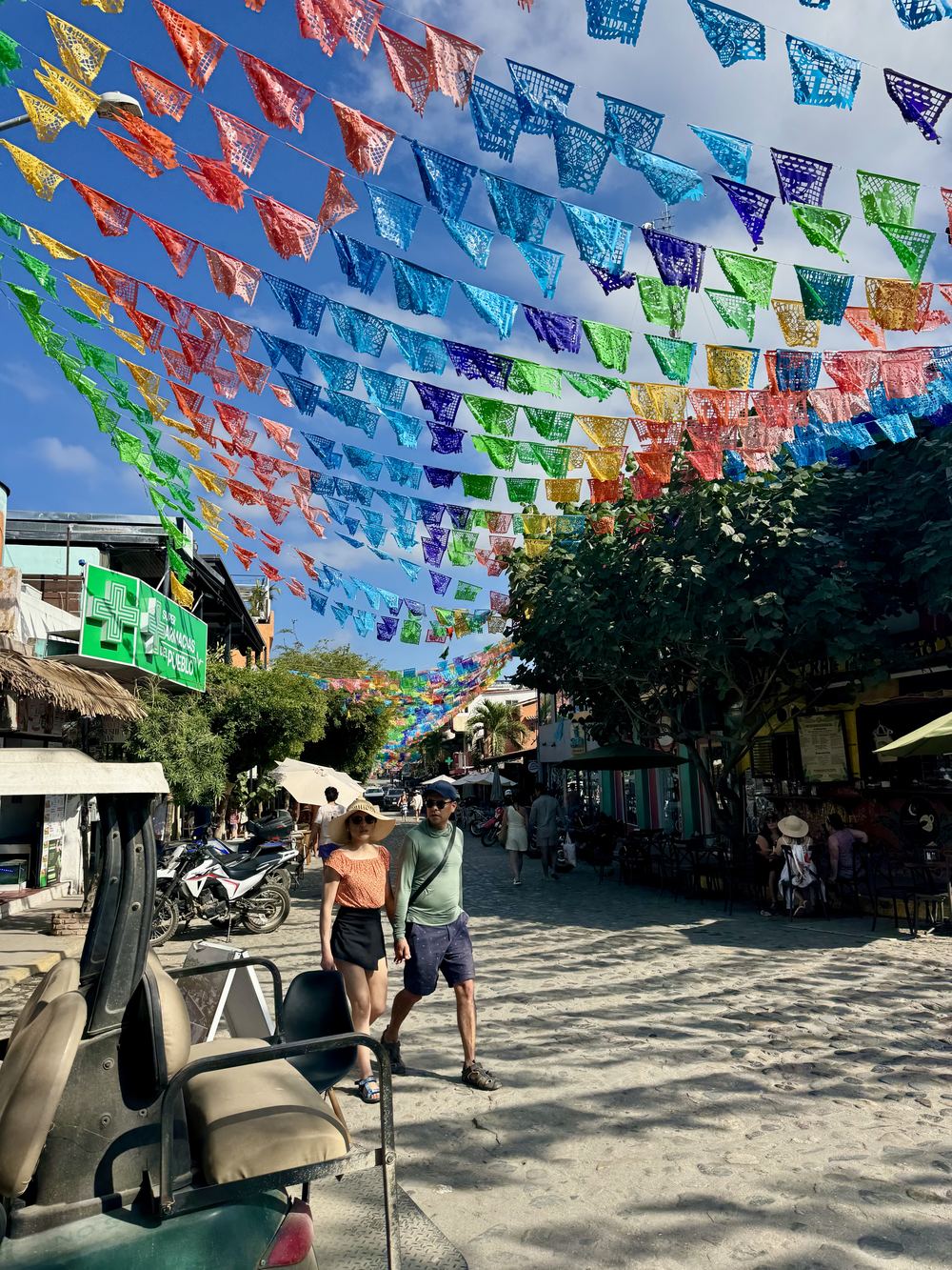 Papel picado over a Sayulita street